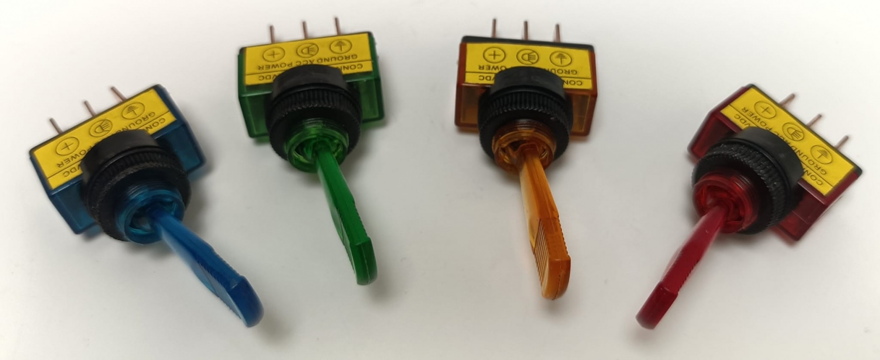 přepínač páčkový 12V(žlutý,modrý,červený,zelený)