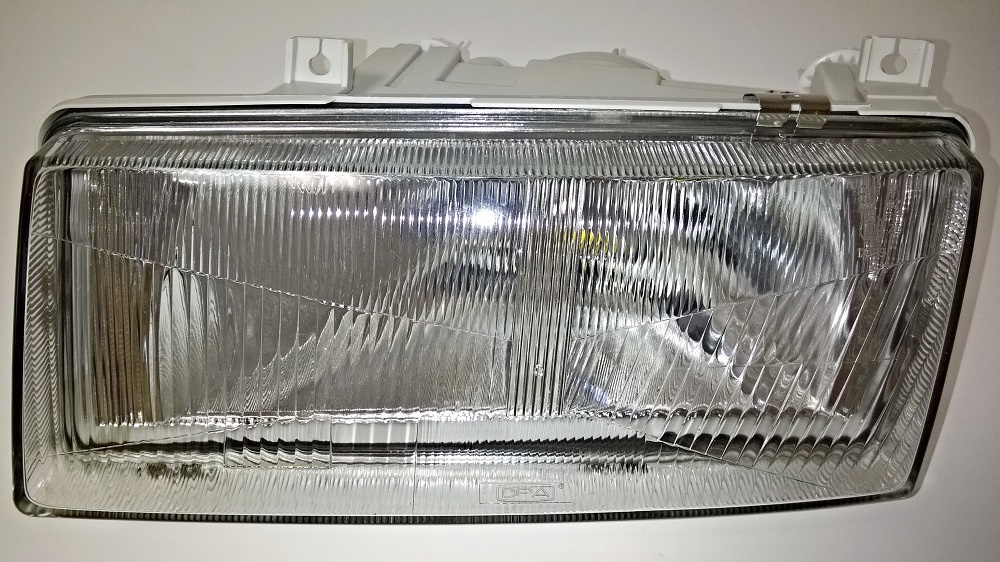 světlomet př. levý - dovoz -FELICIA M98