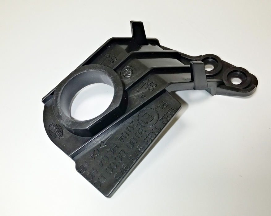 držák světlometu spodní 