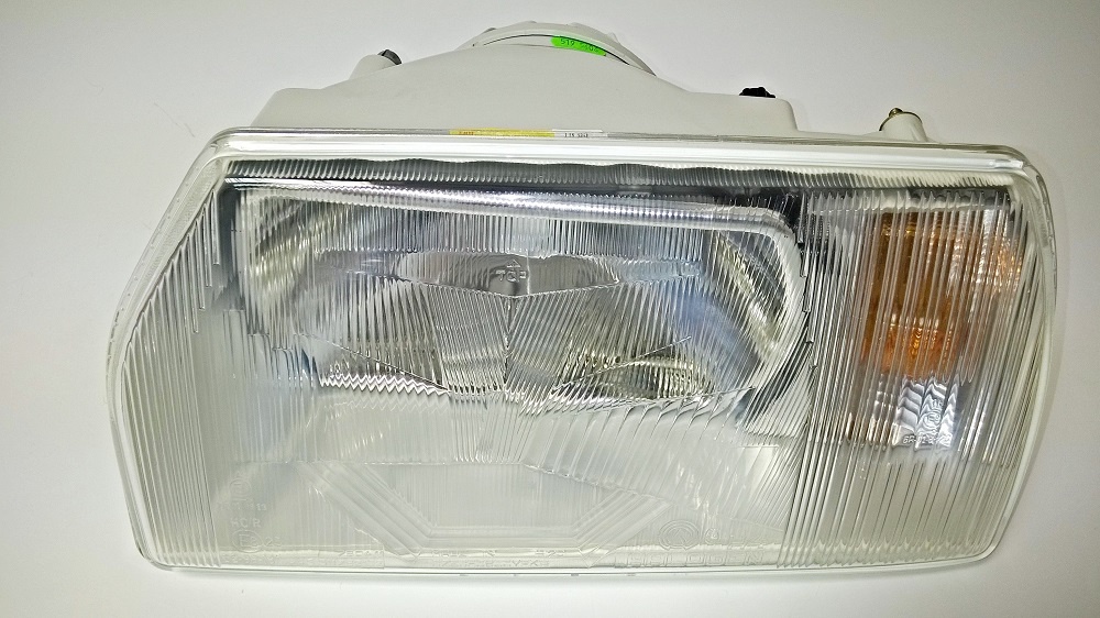 světlomet     FAVORIT -  levý