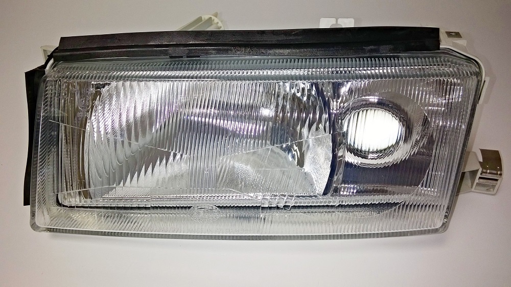 světlomet před. levý s mlhovkou  OCT - TYC